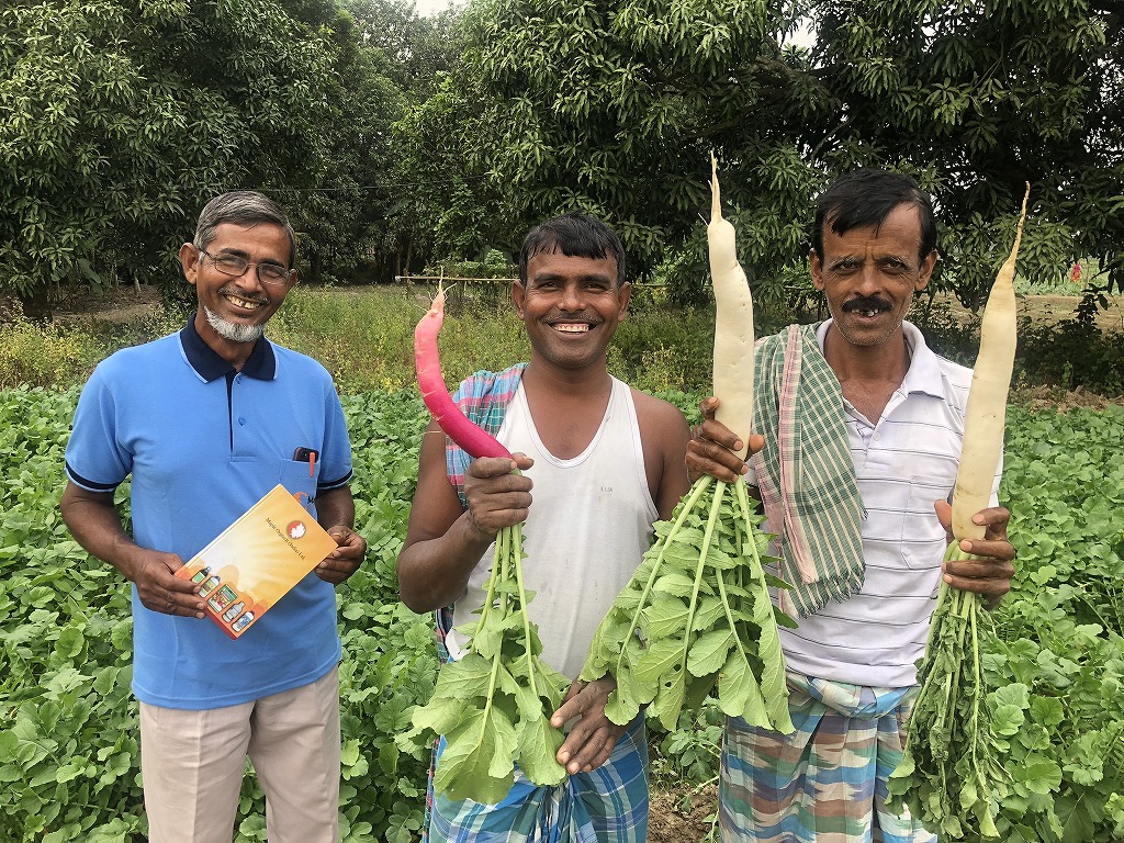 Happy farmers with great harvest