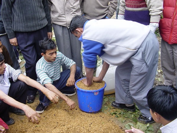 Training farmers on making EM Bokashi