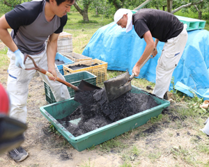 Making mixed material with EM charcoal with salt
